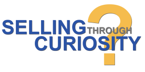 Selling Through Curiosity™ logo featuring a yellow question mark, symbolizing inquiry and engagement in sales training by RAMPT Consulting.